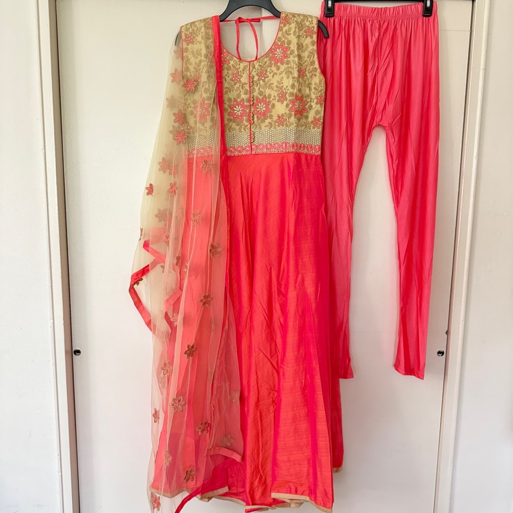 Womens Anarkali dress with salwar and dupatta.